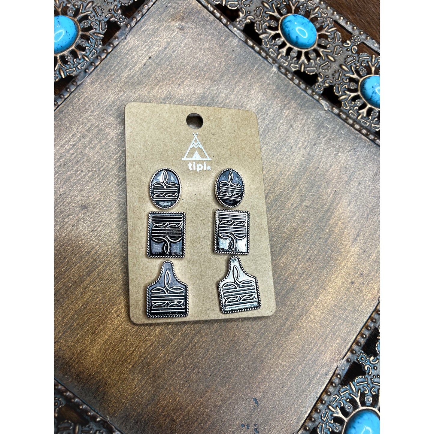 boot stitch earrings